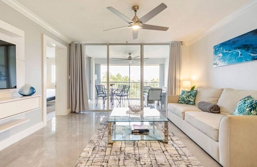 Jupiter Condo | Modern Luxury, Waterfall, Pool, 1/2 mile to Beach