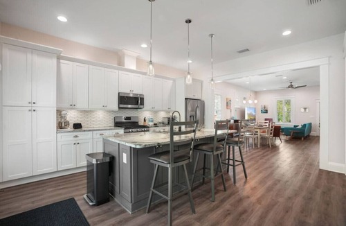 Old Seminole Heights House | Modern Poolside Retreat & Cozy Escape