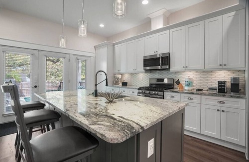 Old Seminole Heights House | Modern Poolside Retreat & Cozy Escape