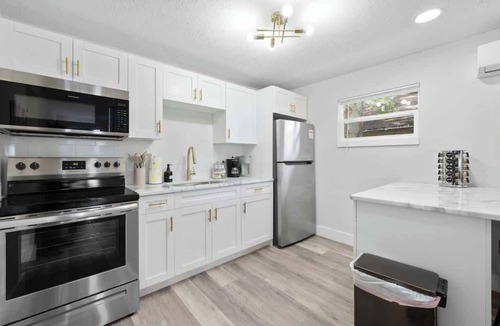 Old Seminole Heights House | Modern Retro Themed Home Close to Coffee and Food!
