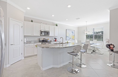 Naples House | Modern Waterfront Home in Artesia | Pool/Gym