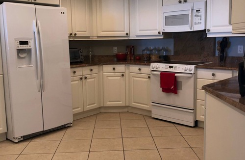 Pelican Bay Condo | Never miss a sunset! Beautiful Condo in Pelican Bay on the beach