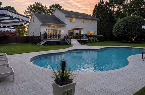 Westhampton House | NEW DECK! Private 1 Acre Family Friendly Home - Heated Pool, Home Office & Gym
