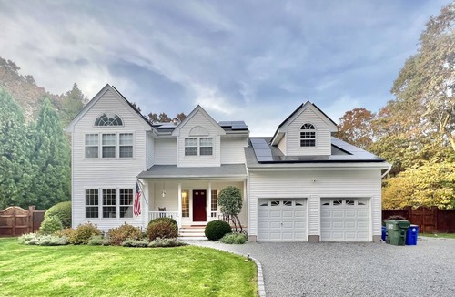Westhampton House | NEW DECK! Private 1 Acre Family Friendly Home - Heated Pool, Home Office & Gym