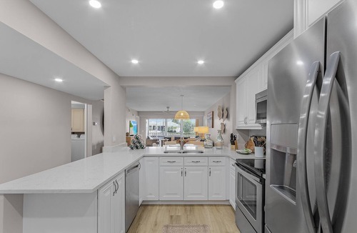 Vanderbilt Beach Condo | New Listing Discount! Beach Walk - Directly across the street from Vanderbilt Beach!