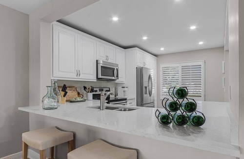 Vanderbilt Beach Condo | New Listing Discount! Beach Walk - Directly across the street from Vanderbilt Beach!
