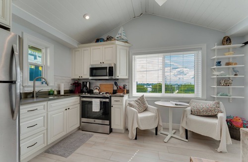 Bradenton Beach Cottage | NEW LISTING. High Tide—- Beach and Bay just steps away!