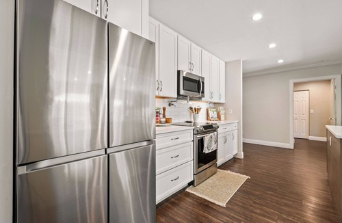 North Palm Beach House | (NEW) Tiki Palm House | Poolside Chef’s Kitchen