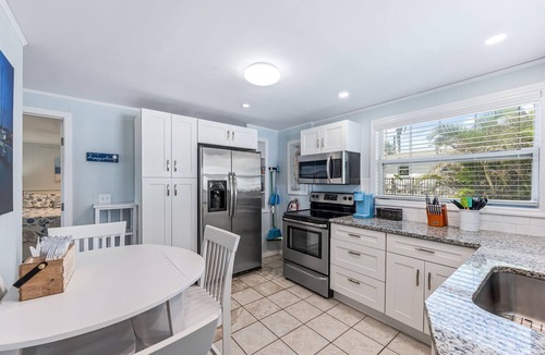 Hills T P House | 🐾 New to Market - Dog Friendly, Large Heated Pool, Short Walk to Restaurants and Beach!