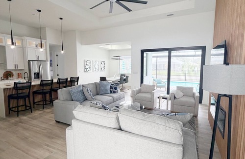 Trafalgar House | Newly Built Modern Vacation Home 4 BR/3 BA Your Own Heated Pool, Lanai on Canal