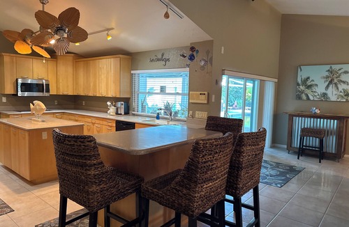 Seminole House | Newly Listed The Ambrosia House Retreat with Saltwater Pool, 4 king beds, 5 TVs