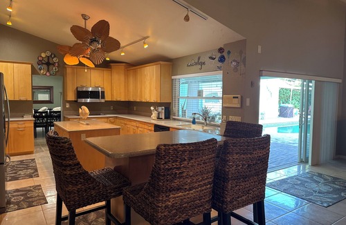 Seminole House | Newly Listed The Ambrosia House Retreat with Saltwater Pool, 4 king beds, 5 TVs