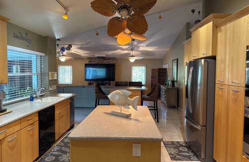 Seminole House | Newly Listed The Ambrosia House Retreat with Saltwater Pool, 4 king beds, 5 TVs