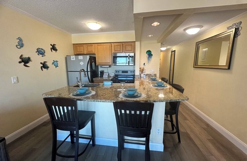Rocky Point Condo | Newly remodeled with sunset views! Heated pool, private beach and family owned!