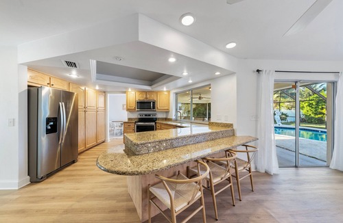 Palm River Estates House | Newly Renovated! Tropical Bliss - Heated Pool, 5 miles to Vanderbilt Beach!
