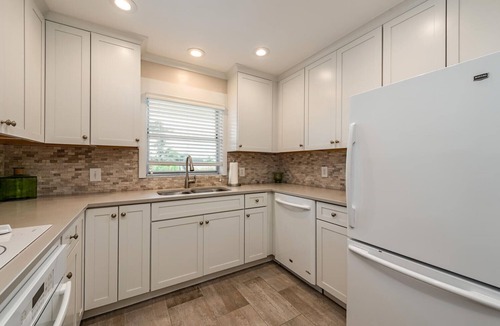Royal Harbor Condo | Newly renovated Waterfront condo with new heated pool and dock