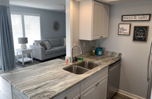 Holiday Isle House | Newly updated 1 bedroom 1 bathroom condo with gorgeous views of the golf course.