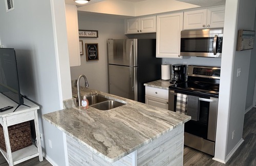 Holiday Isle House | Newly updated 1 bedroom 1 bathroom condo with gorgeous views of the golf course.