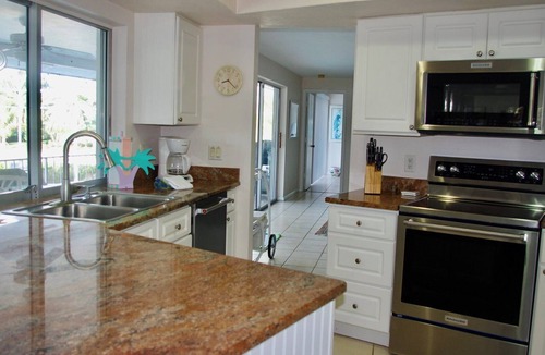 Shell Harbor House | Now Available! Enjoy Panoramic Water Views, Pool, Dock, Beach Parking Permit & Pup Friendly!