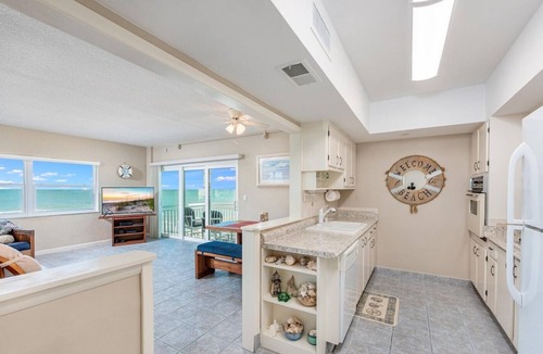 South Patrick Shores Condo | OCEAN BREEZE ESCAPE - 2nd Floor Balcony with FULL oceanfront views! 2 bdr 2 Bath
