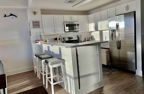 Panama City Beach Condo | Ocean Breeze at Calypso Tower III Amazing Sunsets! Beach chair setup included!