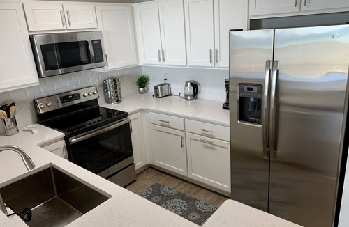 Panama City Beach Condo | Ocean Breeze at Calypso Tower III Amazing Sunsets! Beach chair setup included!