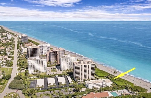 Juno Beach Condo | OceanFront Condo Renovates with Heated Pool & Hot tub Directly on the Beach!