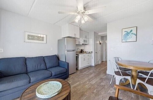 Crescent Beach Condo | Oceanfront Patio Suite with daily housekeeping and welcoming front desk staff