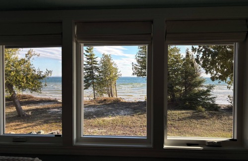 St Ignace House | Octagon Beach House Enjoy a tranquil getaway w/private beach on Lake Michigan