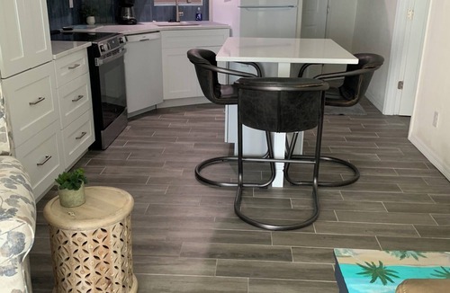 Mid Island Condo | ON THE BEACH AT THE SOFT WHITE SANDY SHORELINE