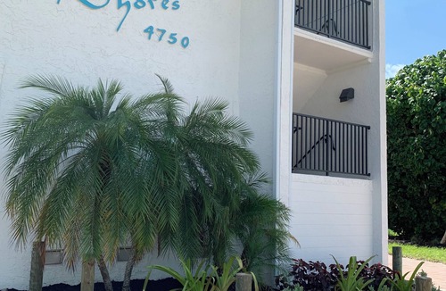 Mid Island Condo | ON THE BEACH AT THE SOFT WHITE SANDY SHORELINE