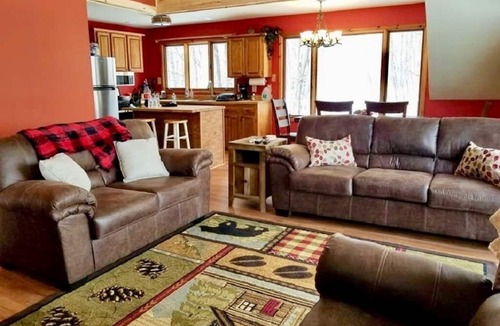Thompsonville House | On the Betsie River, fish off dock, close to Crystal Mountain, trails, lakes!