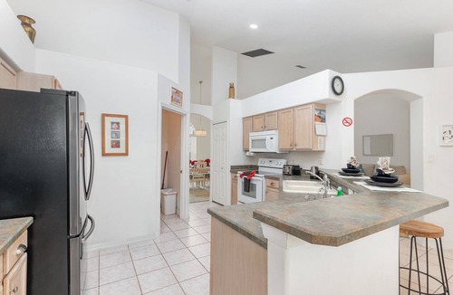 Orange Tree House | Orange Tree Pool Home with spa. Enjoy recreation and relaxation in this inviting community near the best of Orlando's hot spots!