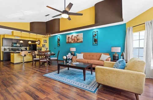 Royal Palm Bay Apartment | Orlando/Kissimmee Polynesian Inspired Oasis with Pool, Minutes from Disney.