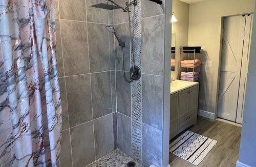 Pine Hills House | Orlando pool house 4BR near Universal Studios, Downtown, Arcade game