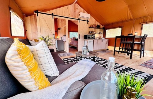 Punta Gorda RV Rental | Outstanding Safari Tent with Jacuzzi and and Beautiful Outdoor and Indoor Living in Florida