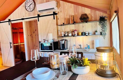 Punta Gorda RV Rental | Outstanding Safari Tent with Jacuzzi and and Beautiful Outdoor and Indoor Living in Florida