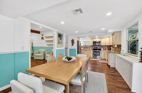 Parrot Cove House | Palm Beach Pool Oasis Walk to Golf, Beach, and the Ave