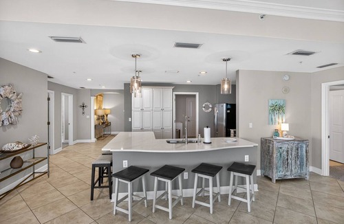 Upper Grand Lagoon Condo | Panoramic Stylish Gulf Retreat w/Epic Pool Area