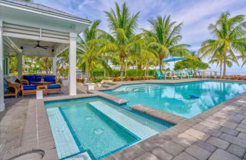 Marathon Villa | Paradise Point Pet friendly Oceanfront Luxury vacation rental with pool, dock and outdoor kitchen