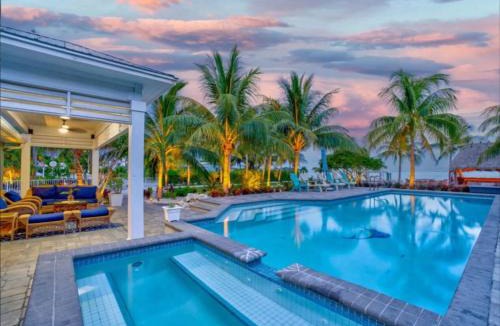 Marathon Villa | Paradise Point Pet friendly Oceanfront Luxury vacation rental with pool, dock and outdoor kitchen