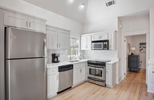 Cottage District House | Park District Home with Carriage House, 6-Passenger LSV, and 4 Bikes