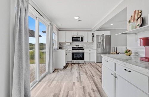 Six Lakes Cottage | Peaceful 2-bedroom cottage on beautiful First Lake in Six Lakes, Michigan.