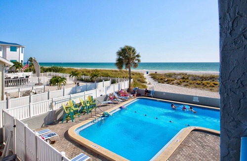 Treasure Island Condo | Peaceful Beachfront Vacation, Pool, Hot Tub, Tiki Bar & Tickets Included for Top Area Attractions!