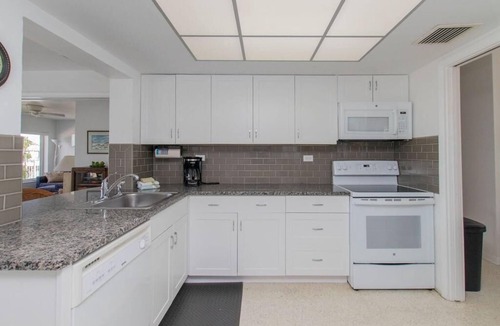 Key Colony Beach House | Peaceful canal-front 3/3 Single-Family Home w/Private Pool & Cabana Club Access