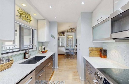 Bonita Bay Condo | Peaceful top floor condo with golf views and resort amenities