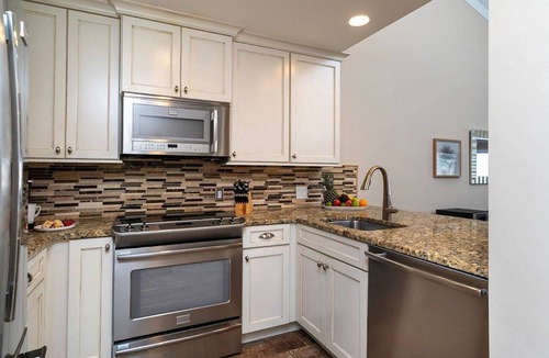 Holiday Isle Condo | Perfect for Boat & Pets! Private Slip on Canal, Sundeck Overlooks Water, Walk 2 Beach, Holiday Isle