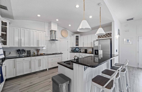 Marineland Acres House | Pet-Friendly Beach Home WGolf Cart, Pool, Hot Tub