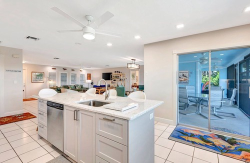 Bay Harbor Estates House | Pet-Friendly Canal Pool Home & Boat Dock