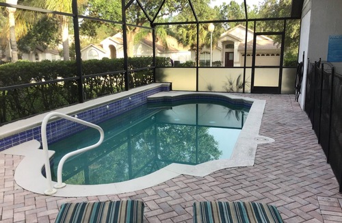 Orange Tree House | Pet Friendly - Spacious corner lot with privacy hedges. Country, cozy feel minutes from the theme parks!